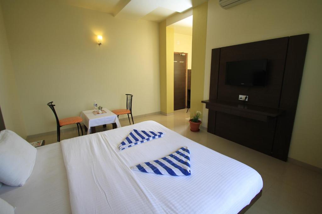 Hotel Sai Smaran Ширди Номер фото